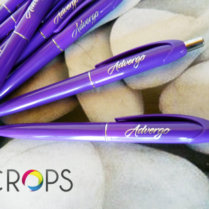 Glasses and pens with a logo