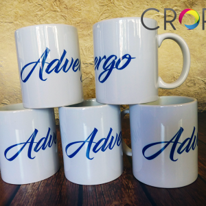 Glasses and pens with a logo