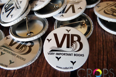 Round badges with a safe needle