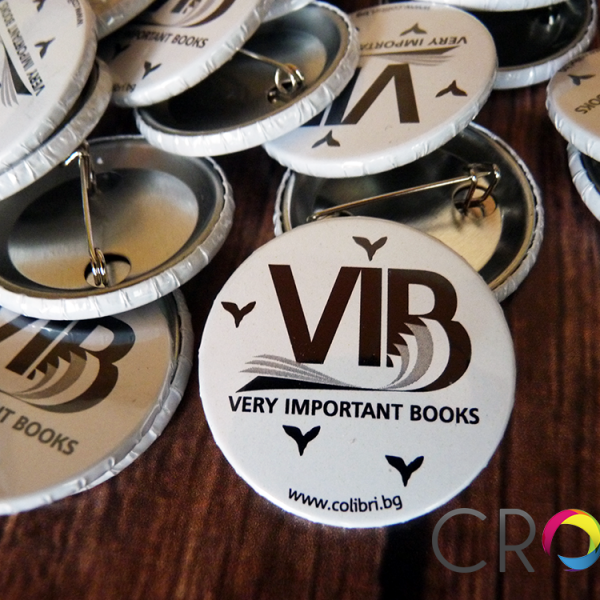 Round badges with a safe needle